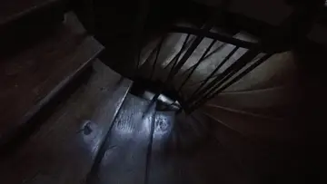 Wooden stairs in shadow